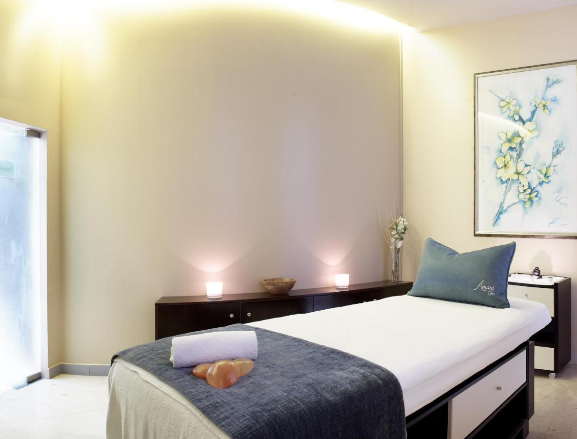 Radisson Blu Hotel & Convention Centre Kigali Exterior photo A treatment room at a spa