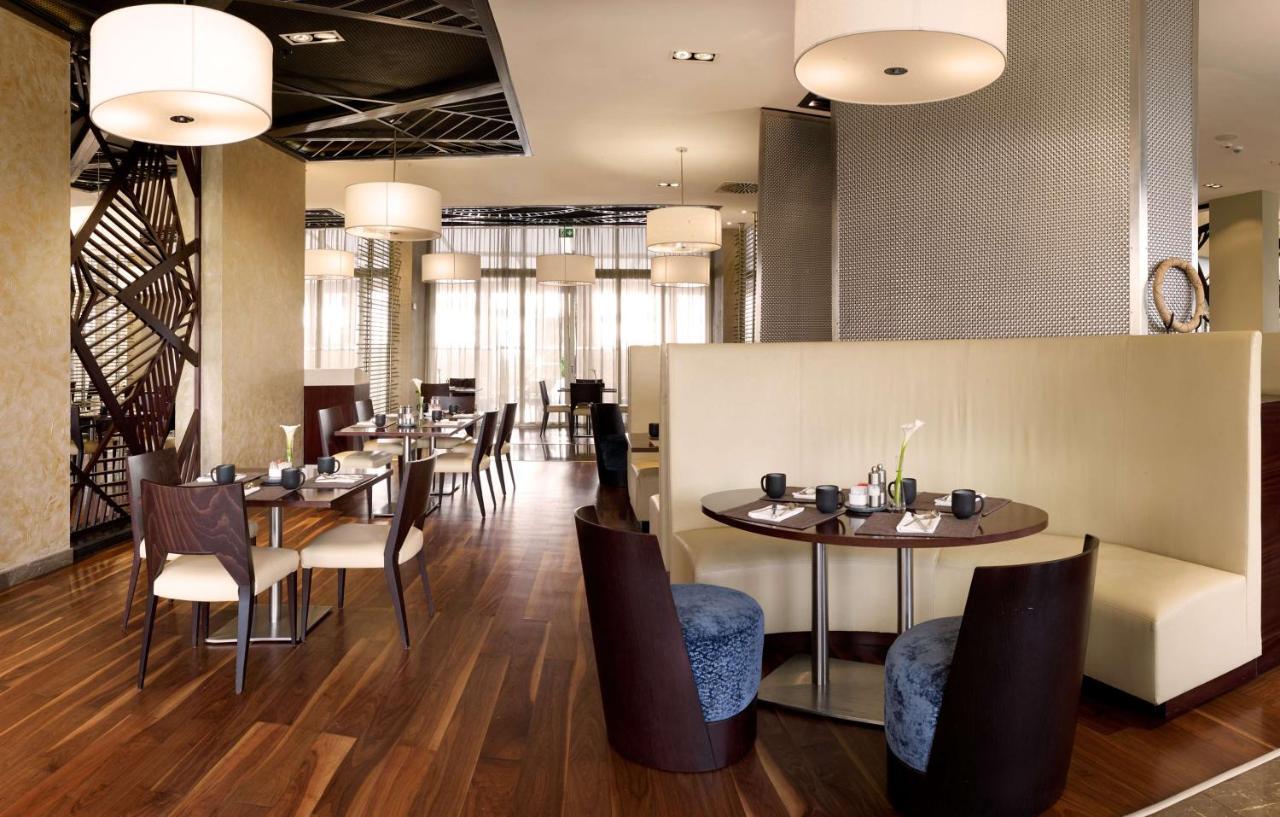 Radisson Blu Hotel & Convention Centre Kigali Exterior photo The interior of the restaurant
