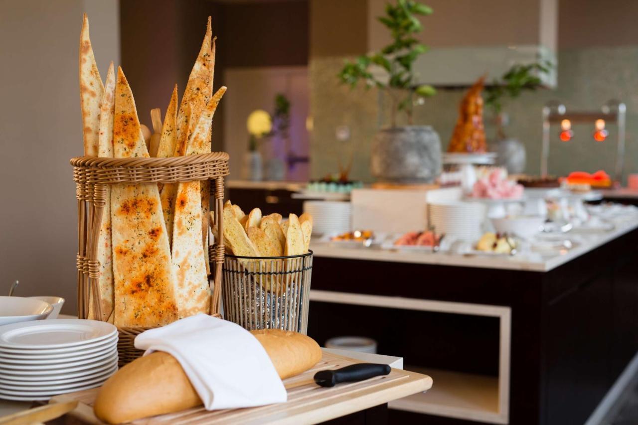 Radisson Blu Hotel & Convention Centre Kigali Exterior photo Bread at a buffet